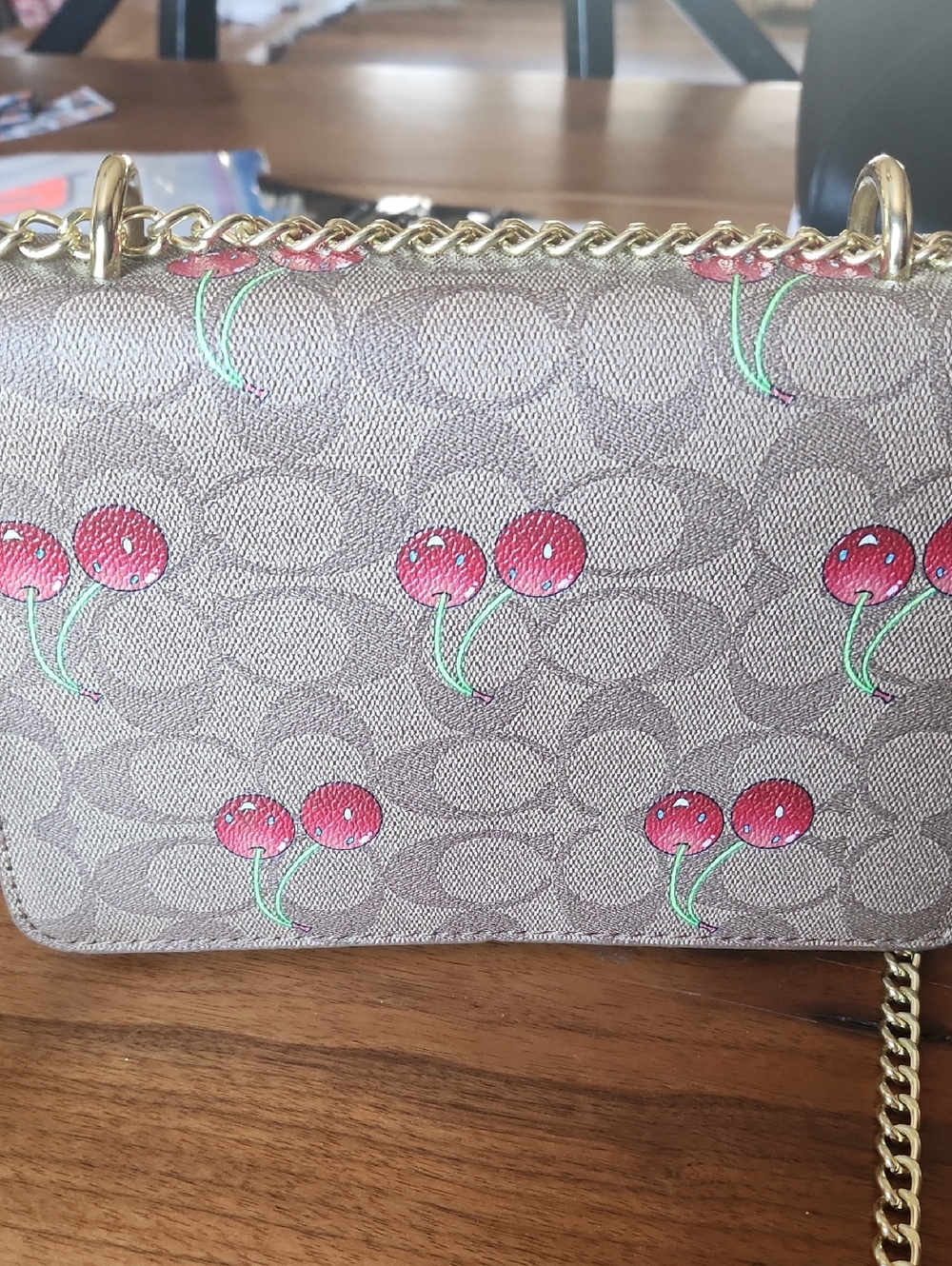 Fashion to Figure Beige Logo Crossbody with Red Cherry Accents